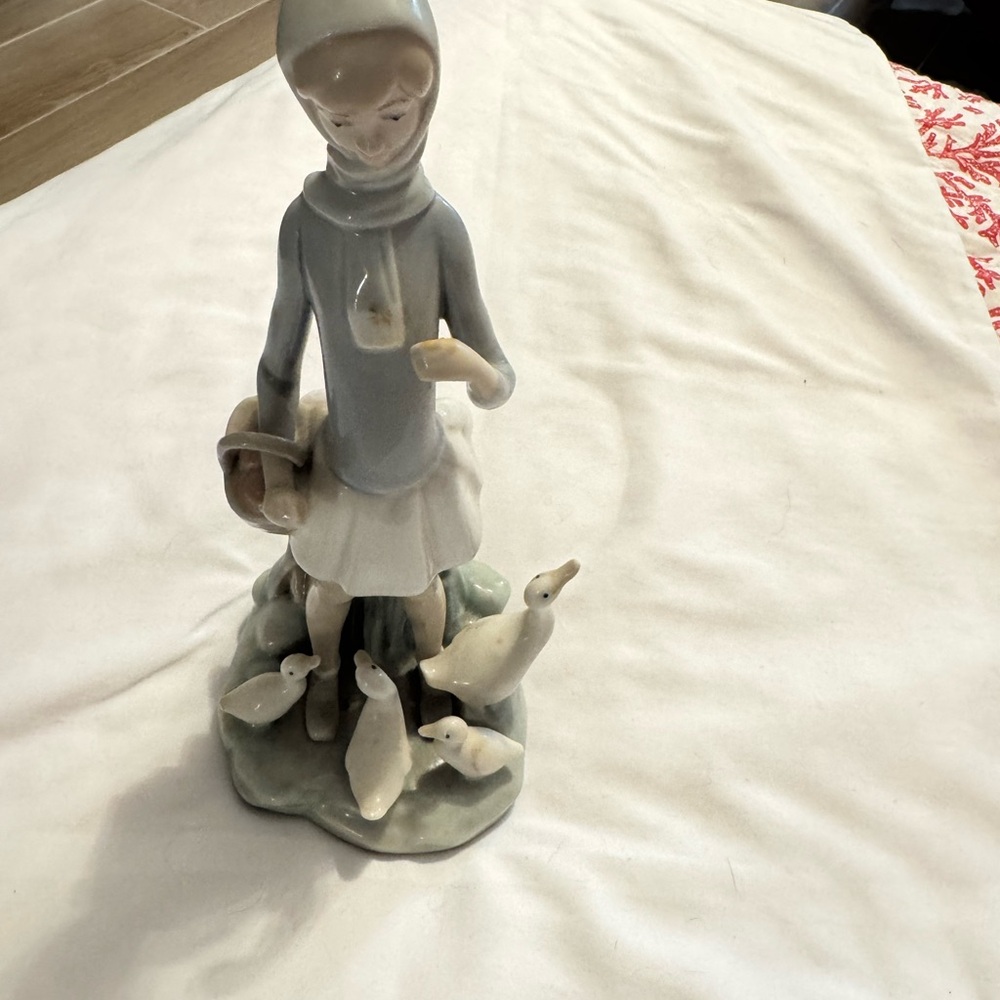 Lladro Gray and White Porcelain Sculpture with Pastoral Elegance
